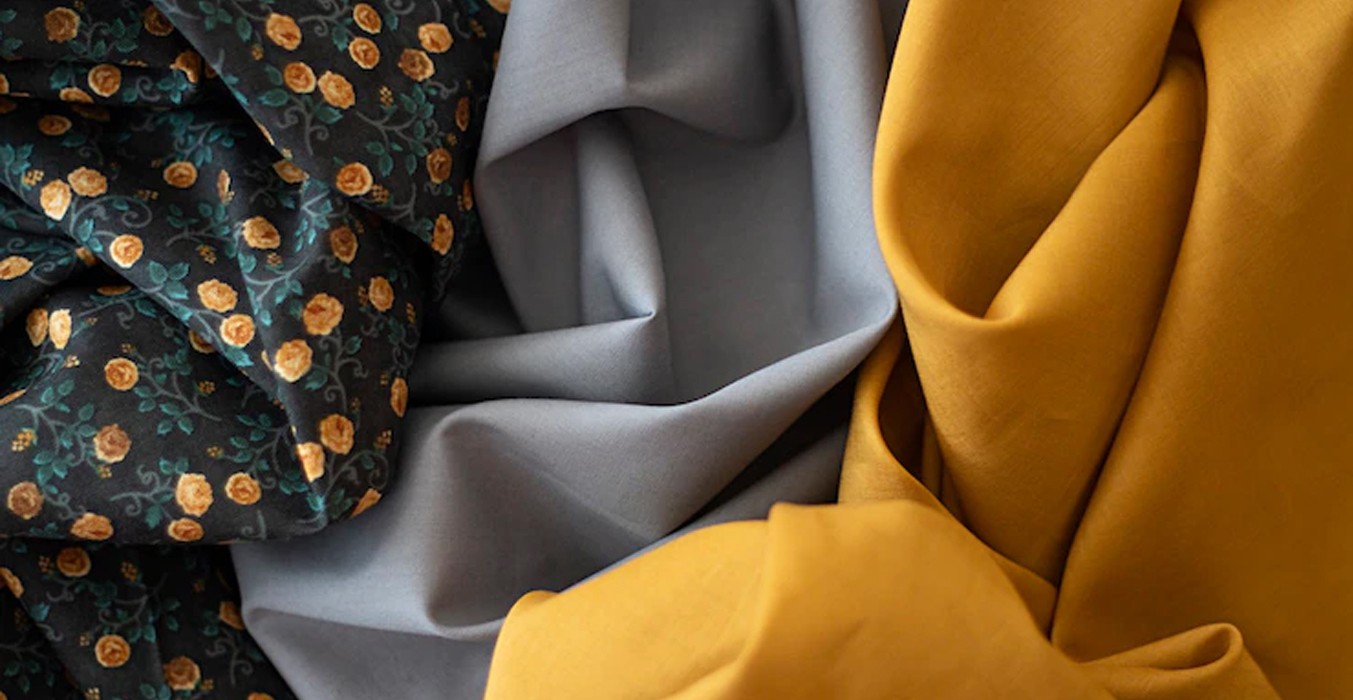 Two women selecting garments in a clothing store